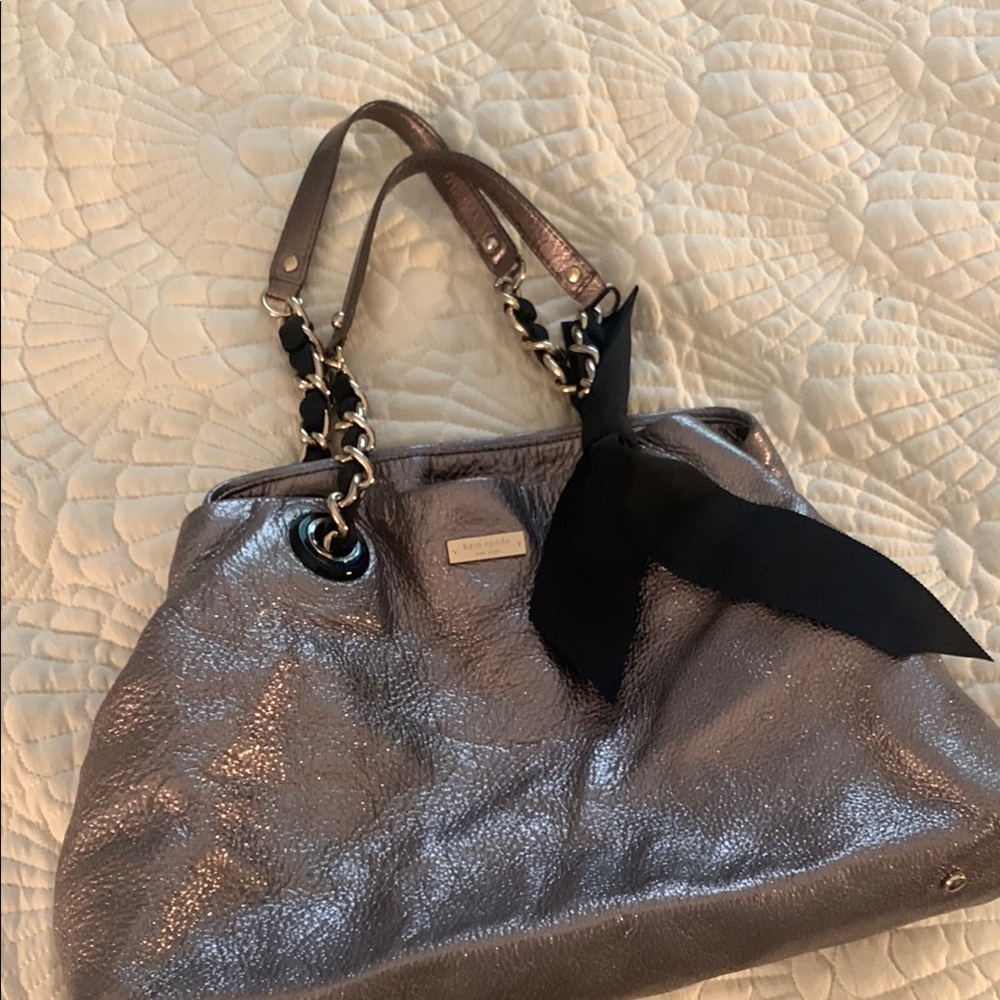 Kate Spade Elegant Metallic Tote Bag. With black ribbon. Preowned.